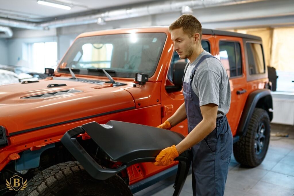 A car technician fixing the engine